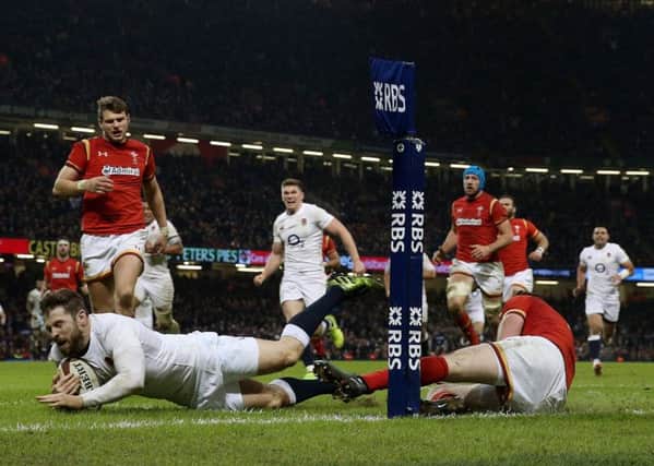 England's Elliot Daly scores the decisive try to defeat Wales at the Principality Stadium, Cardiff (Picture: David Davies/PA Wire).
