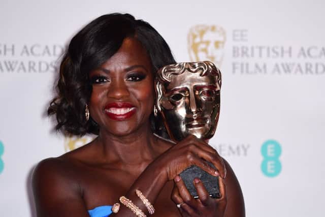 Viola Davis with the award for Best Supporting Actress for the film Fences