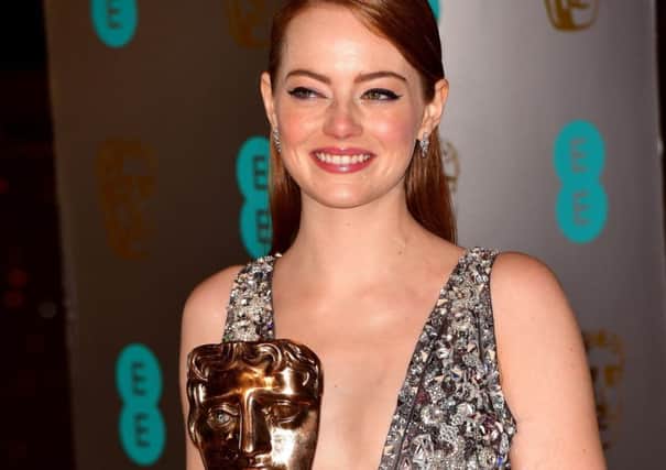 Emma Stone with her BAFTA award for best actress for La La Land