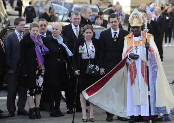 Katie's parents, Paul and Alison Rough (second and third right), arrive at York Minster with the Archbishop of York Dr John Sentamu for her funeral service.