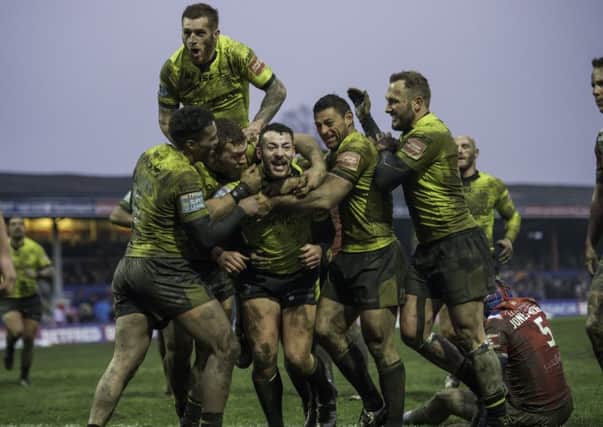 Hull FC players celebrate Jake Connor's match-winning try against Wakefield (Picture: Allan McKenzie/SWPix.com).