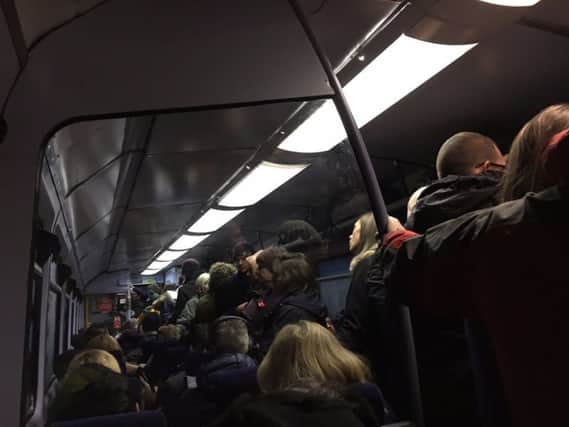 An overcrowded train carriage between Hebden Bridge Railway Station and Manchester taken by passenger Joshua Fenton-Glynn