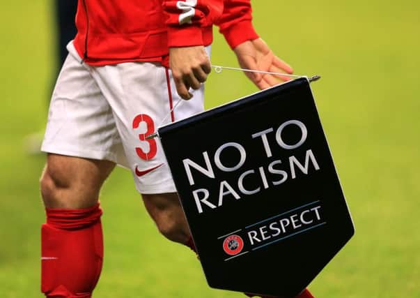 Continuing battle: Racism still remains an issue in sport today. (PA).
