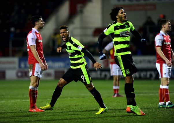 Huddersfield's Elias Kachunga celebrates making it 2-2. (Picture: Jonathan Gawthorpe)