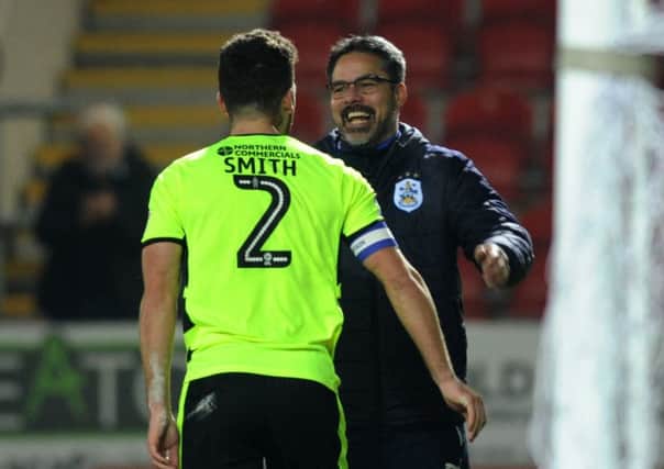 Huddersfield's manager David Wagner congratulates Tommy Smith for scoring the goal that sunk Rotherham on Tuesday night.
 (
Picture: Jonathan Gawthorpe)