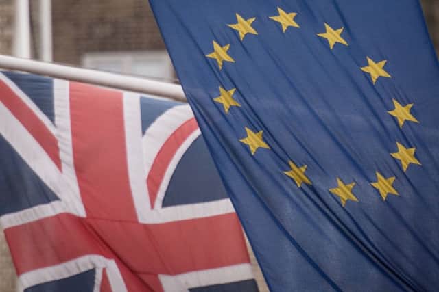 EU and UK flags. Photo: Stefan Rousseau/PA Wire