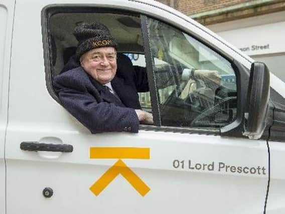 Lord Prescott in the driver's seat of the number 01 KCOM van
