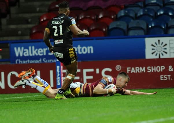 Huddersfield centre Alex Mellor scored his first two tries since joining the club from Bradford Bulls but ended up on the losing side last night (Picture: Jonathan Gawthorpe).