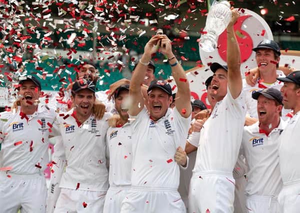England captain Andrew Strauss lifting the Ashes Urn after winning the fifth test at the Sydney Cricket Ground, Sydney, in, 2011.