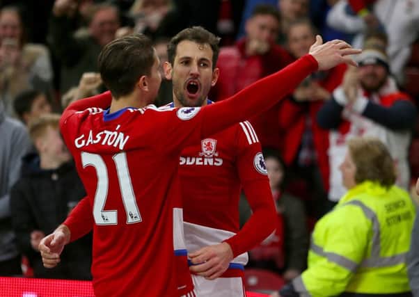 Middlesbroughs Cristhian Stuani celebrates with Gaston Ramirez after scoring his sides decisive goal against Oxford United (Picture: PA).