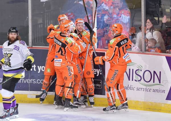 JUST FOR STARTERS: Robert Dowd celebrates his 14th-minute opener against Manchester Storm. Picture: Dean Woolley.