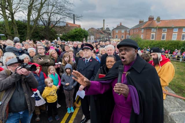 Dr John Sentamu with crowds in Tadcaster. Picture: James Hardisty