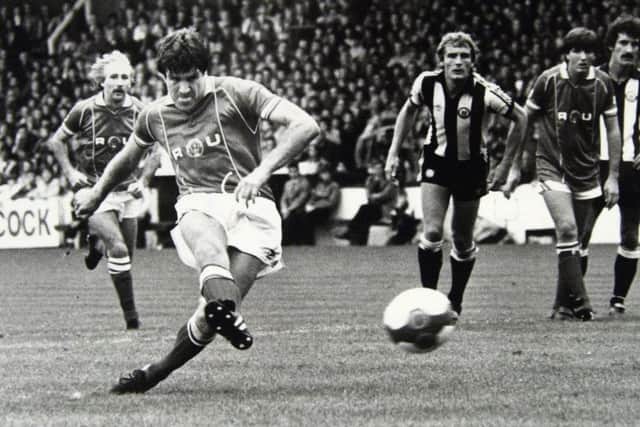 Rotherham United player-boss, Emlyn Hughes, in action during the 1982-83 season.