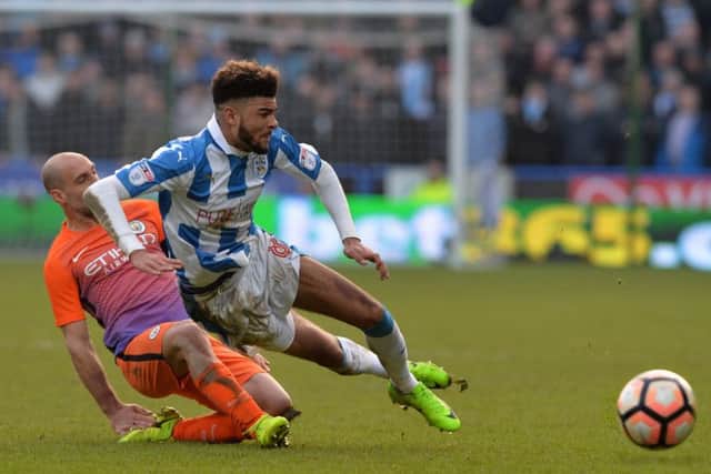 Philip Billing goes down after a challenge from Pablo Zabaleta.  Picture: Bruce Rollinson