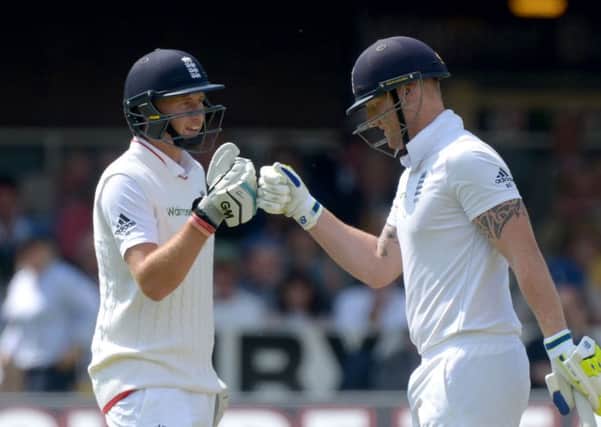 England's Joe Root and Ben Stokes touch fists during an innings together at Lord's in the summer of 2015. Picture: Anthony Devlin/PA