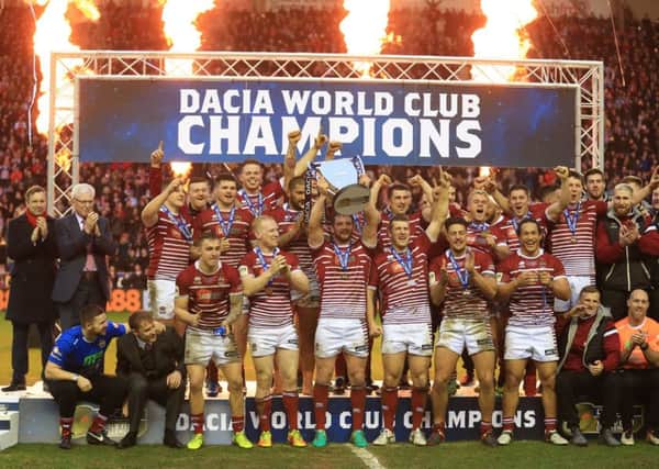 Wigan Warriors celebrate their World Club Series win. Picture: Nigel French/PA