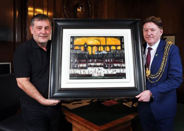 Artist Sean Durkin (left) with Lord Mayor of Leeds Coun Gerry Harper and the painting.  Picture Tony Johnson
