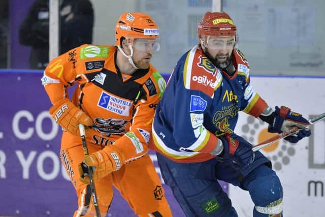 Zack Fitzgerald, left, in action against Edinburgh Capitals on Wednesday night. Picture: Dean Woolley.