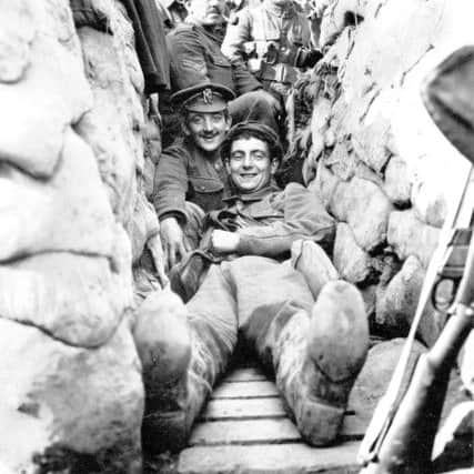 From Britain in Focus at the 

National Media Museum: 

Men of 1/5 York and Lancaster Regiment in International Trench near the Yser Canal north of Ypres, 1915, Unknown. Â©Jon Cooksey
