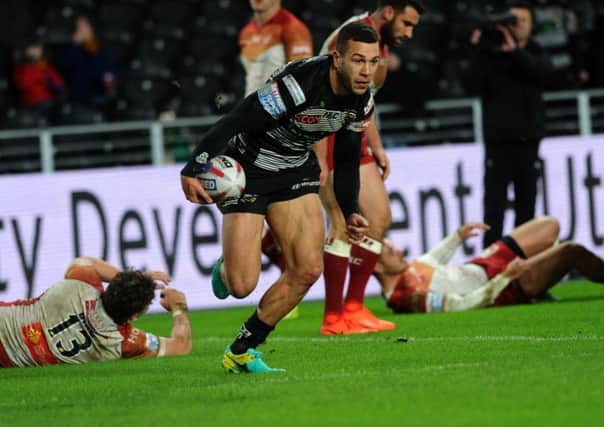Hull's Carlos Tuimavave goes over to score their first try