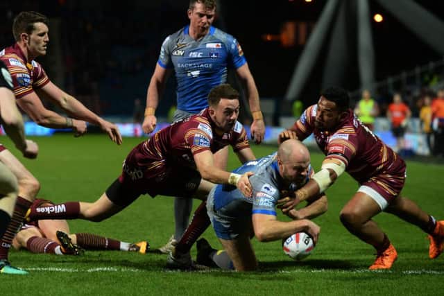 Liam Finn goes over for Wakefield's first try. against Huddersfield Giants.  Picture: Bruce Rollinson