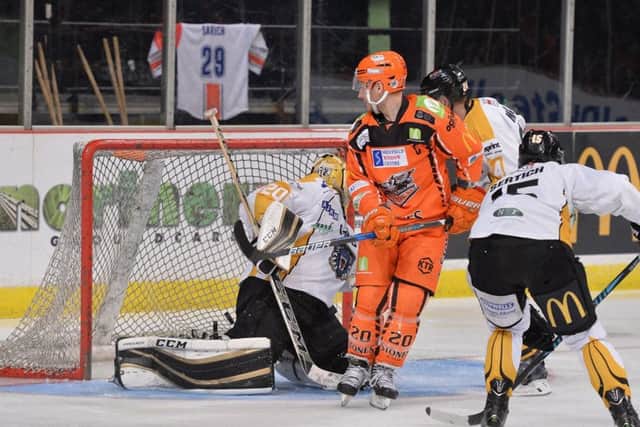 Jonathan Phillips tips in for his first and Sheffield Steelers' second of the night.