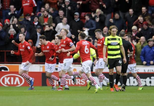 Barnsley players celebrate their equalising goal. Picture: Simon Hulme