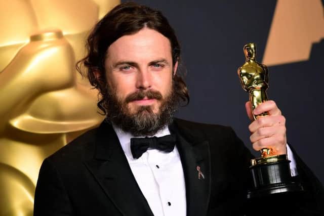 Casey Affleck with the award for Actor in a Leading Role for Manchester by the Sea.