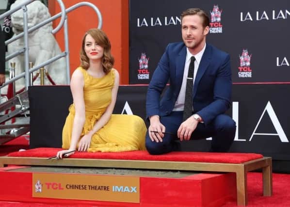 Winners and losers: Emma Stone and Ryan Gosling.