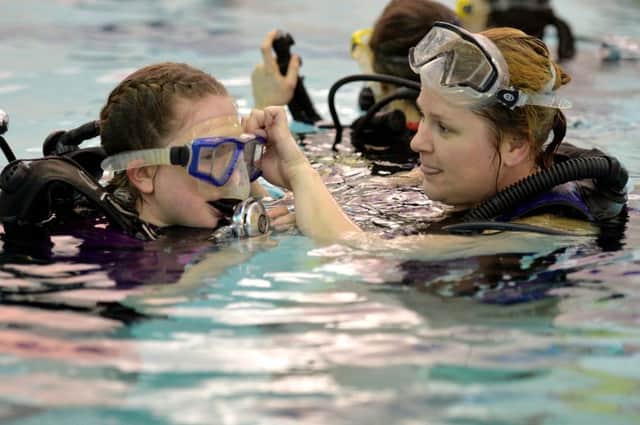 Bradford Sub-Aqua Club members, top, Jessica Westbury, 13, with her mother Victoria. Picture: Roger Moody.