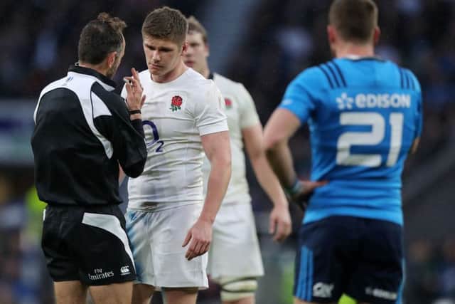 England's Owen Farrell chats with referee Romain Poite on Sunday in the match with Italy (Picture: Andrew Matthews/PA Wire)