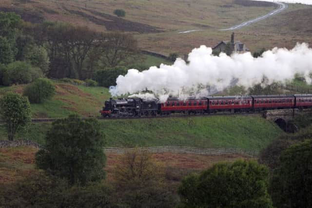 The steam locomotive 45428,  Eric Tracey makes its way from Goathland Station down to Pickering on the North York Moors Railway.