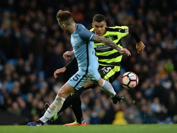 Collin Quaner turns past Manchester City defender Nicols Otamendi
