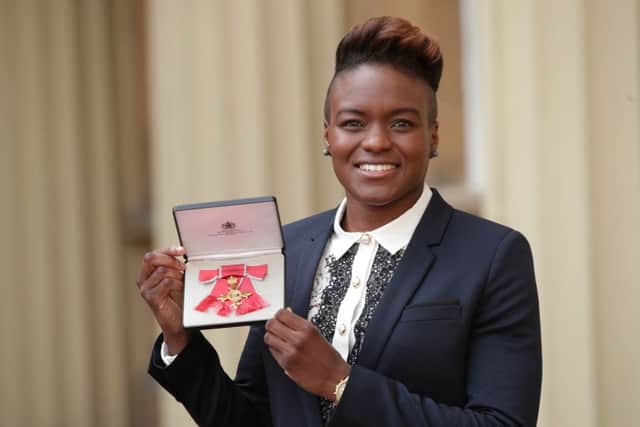 Olympic boxing champion Nicola Adams at Buckingham Palace in London after receiving her OBE from the Duke of Cambridge.