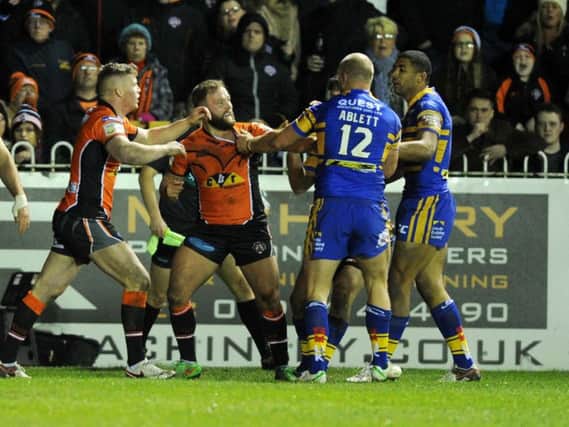 Tempers flare between Castleford Tigers' Paul McShane and Rhinos' Carl Ablett during the derby last year