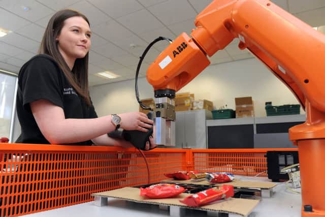 Apprentice: Heidi Butterfield, 19, in the robotics room at the AMRC Training Centre. (Pictures: Scott Merrylees).