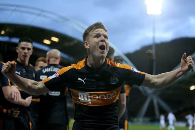 Newcastle United's Matt Ritchie celebrates scoring his side's first goal.