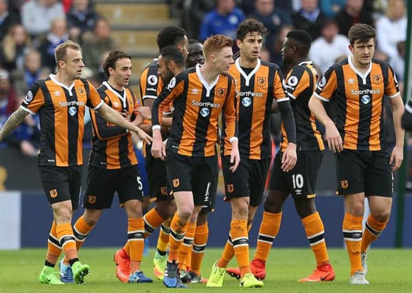 Hull City's Sam Clucas celebrates with team-mates after scoring.