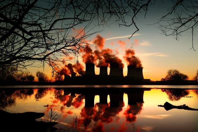 The Sun sets behind Drax Power Station. Picture by Simon Hulme