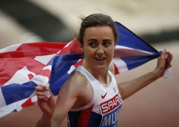 Britain's Laura Muir celebrates winning the women's 3,000m final during the European Athletics Indoor Championships in Belgrade. (AP Photo/Darko Vojinovic)