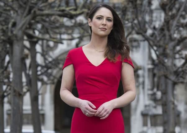 Nicola Thorp at the House of Commons, London, where a bid to make it illegal for companies to require women to wear high heels at work will be debated by MPs later. PRESS ASSOCIATION Photo. Picture date: Monday March 6, 2017. Nicola launched the e-petition, which was signed by more than 150,000 people, after she was sent home from work when she refused to wear high heels.