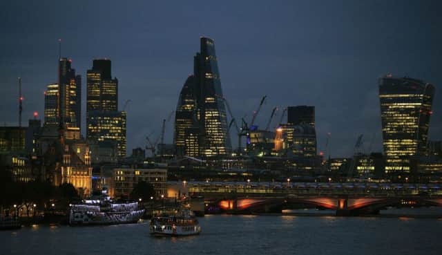 A view of the City of London. SIG today announced that it is cutting its dividend by 20 per cent Photo: Jonathan Brady/PA Wire