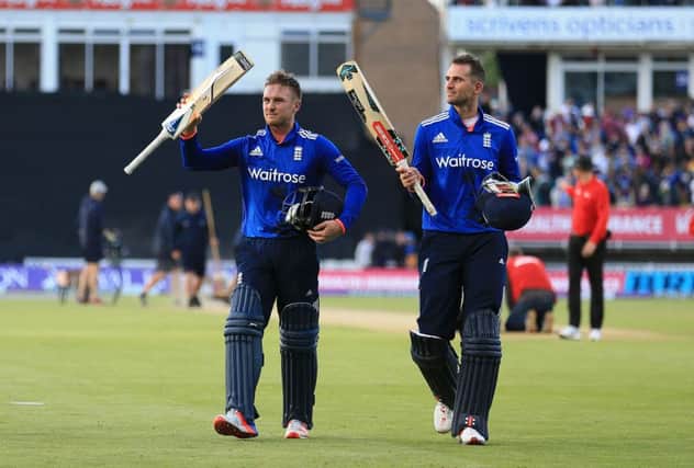 England's Jason Roy (left) and Alex Hales (right) celebrate after finishing not out to beat Sri Lanka at Edgbaston last year. Picture: Nigel French/PA