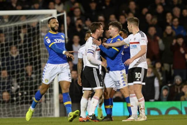 Tom Cairney and Kalvin Phillips square up to each other before the Leeds player is sent off. Picture: Bruce Rollinson