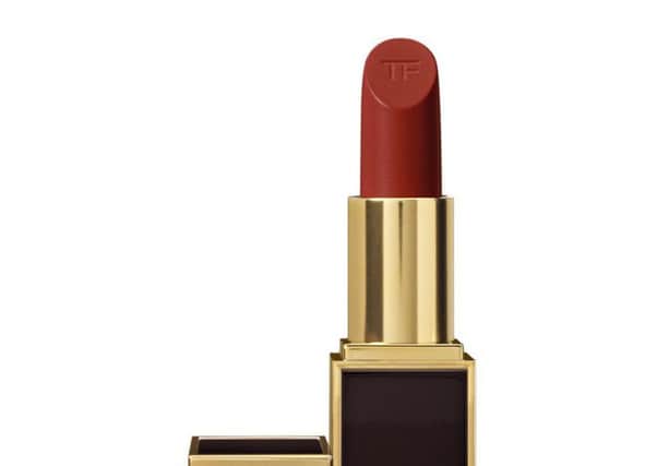 Tom Ford Lip Color in Scarlet Rouge
 - To Tom Ford, the lip is the focus of the face and has the power to define a womans whole look. This is the modern ideal of an essential make-up shade. Ingredients including soja seed extract, Brazilian murumuru butter and chamomilla flower oil creating an ultra-creamy texture with an incredibly smooth application. Specially treated colour pigments are blended to deliver pure colour with just the right balance of luminosity. It's Â£40.