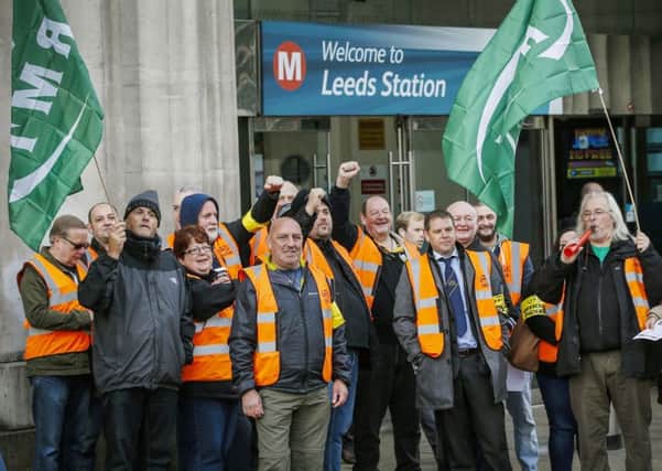 Members of the RMT union picket at Leeds Station during a previous dispute
