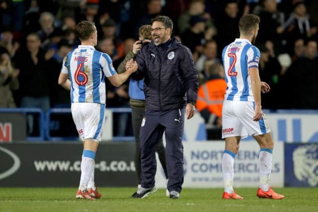 Huddersfield Town manager David Wagner celebrates with Jonathan Hogg after their 1-0 win over Aston Villa. Picture: Richard Sellers/PA