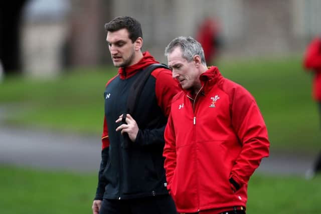 Wales head coach Rob Howley arrives with Sam Warburton for Wednesday's training session at the Vale Resort in Hensol. Picture: David Davies/PA