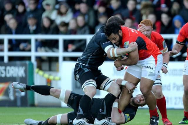 Saracens Billy Vunipola is tackled by Newcastle Falcons Mark Wilson at Kingston Park last Sunday. Picture: Richard Sellers/PA