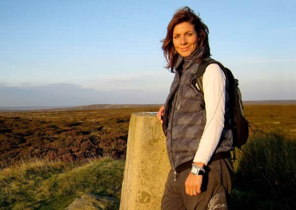 Countryfile presenter Julia Bradbury is backing a campaign for the Coast to Coast walk to be designated as a national trail.